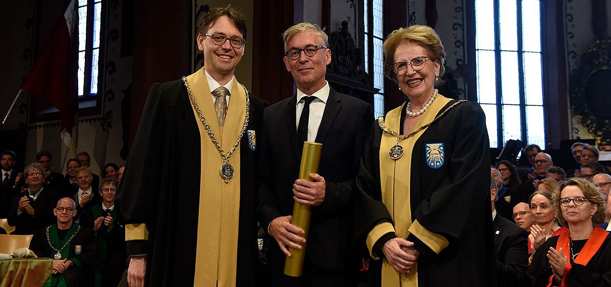 Professor Stutzer, Professor Konrad und Rektorin Schenker-Wicki
